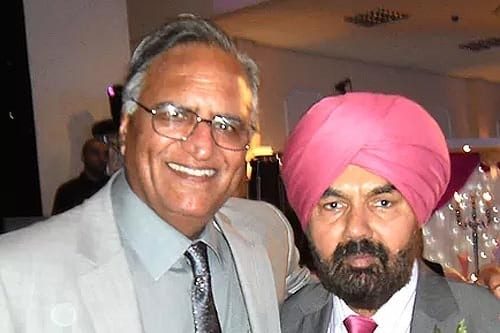 Rahi Bains and famous Punjabi folk singer A S Kang at Mr Kang's daughter's wedding, Midlands, UK
